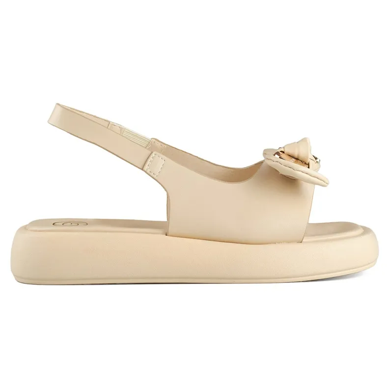 Beige women's platform sandals with a teddy bear bow