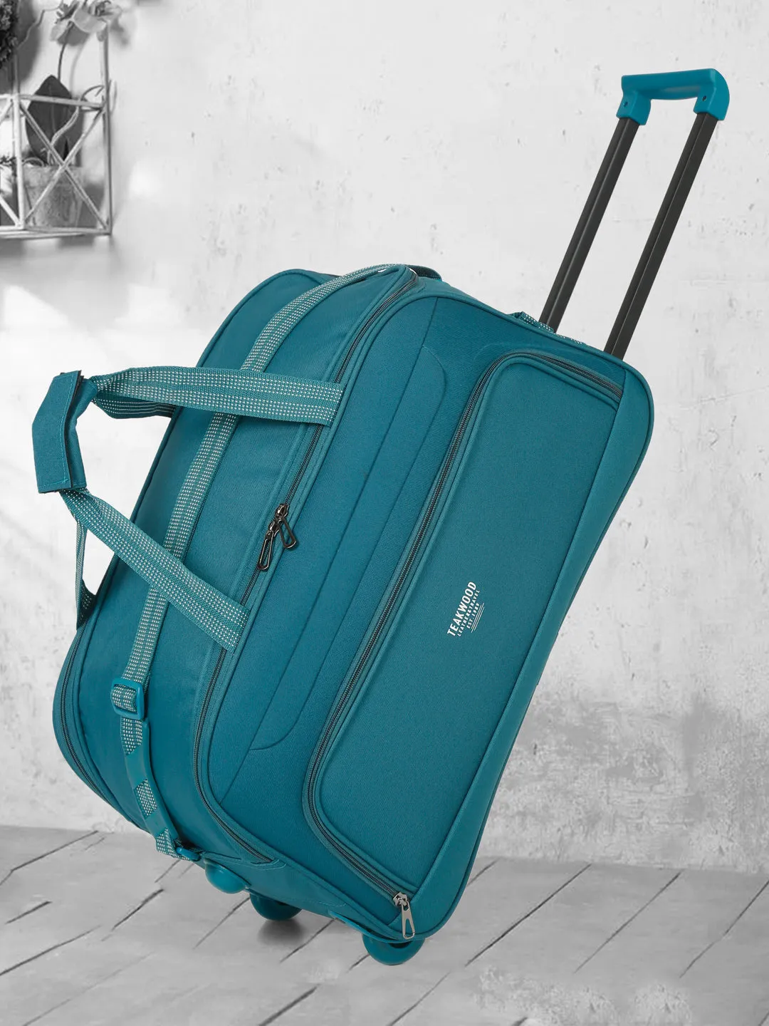 Teal Printed Medium Duffle Trolley Bag